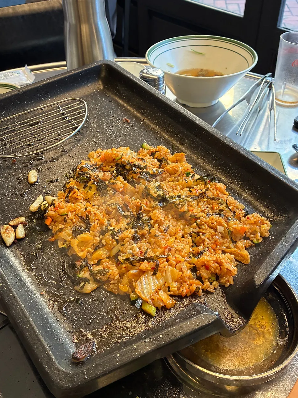 Suyeong fried rice made with seaweed flakes and aged kimchi