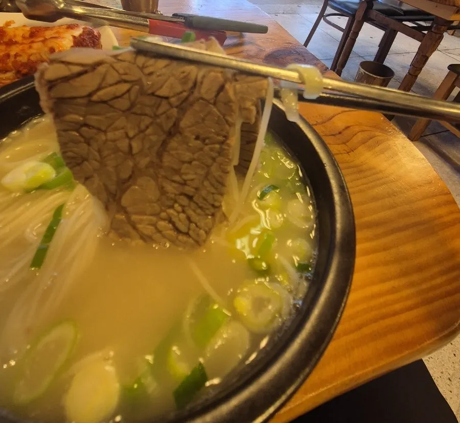 Inside the special seolleongtang, full of beef