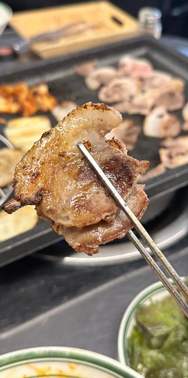 Pork jowl cheek and crispy potatoes