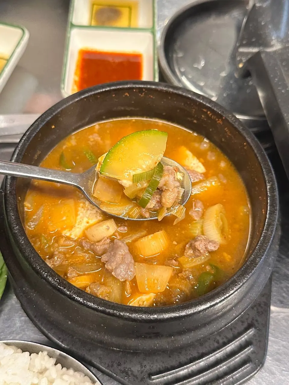 Pork doenjang jjigae with frozen pork accompaniments