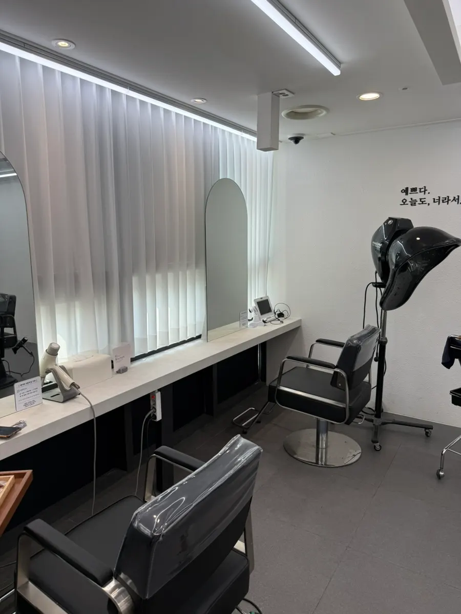 Hair salon interior decorated in clean tones