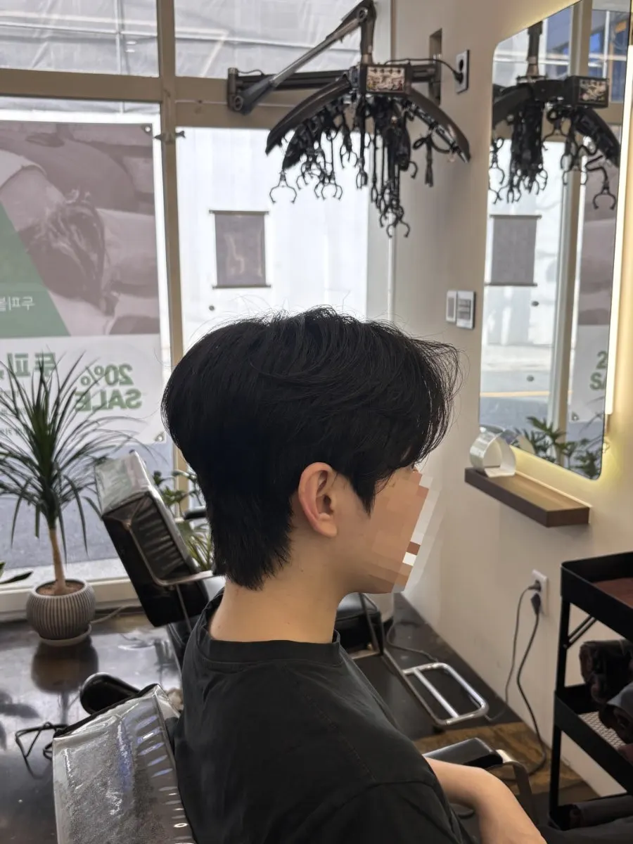 Leaf perm neatly styled from the side and back