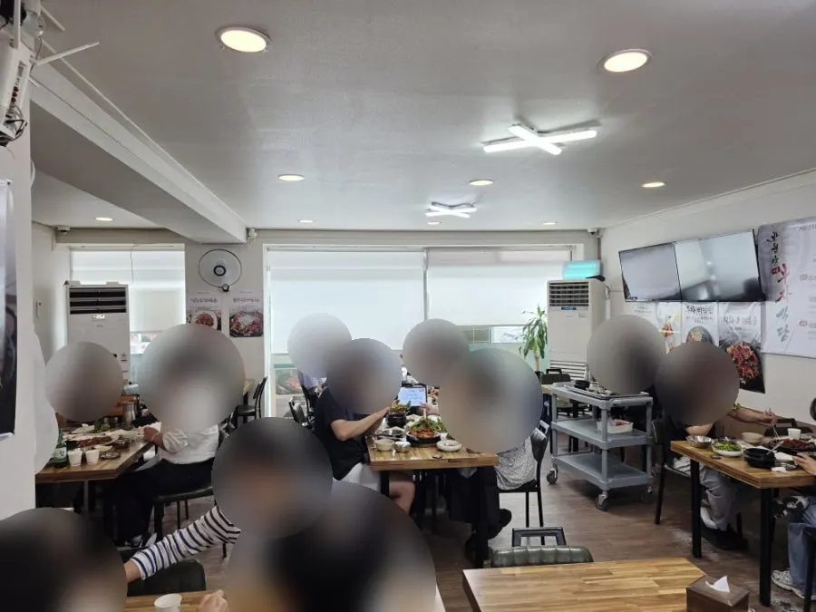Restaurant seating bustling with diners