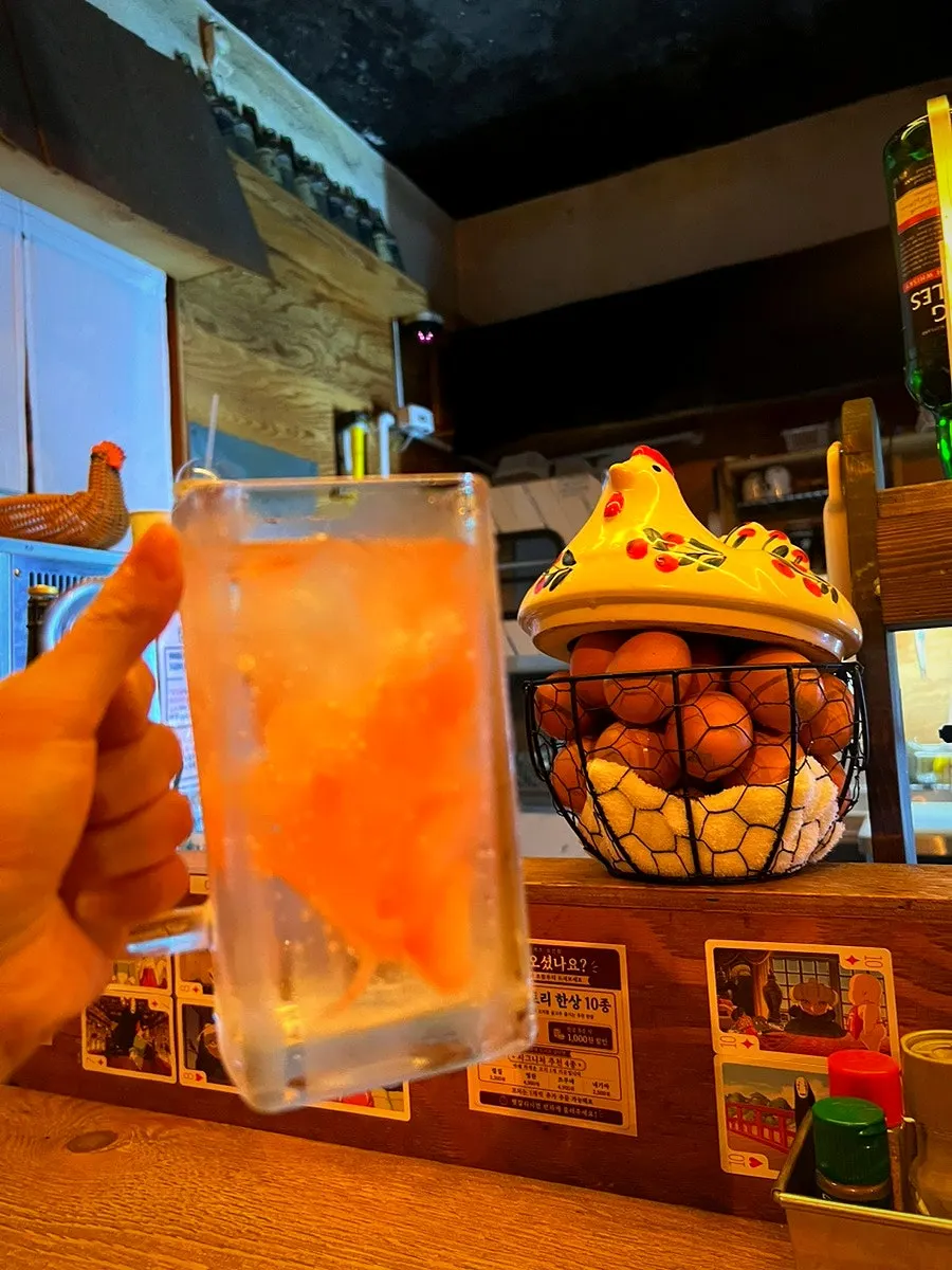 Jinro soju with the complimentary cabbage and house sauce