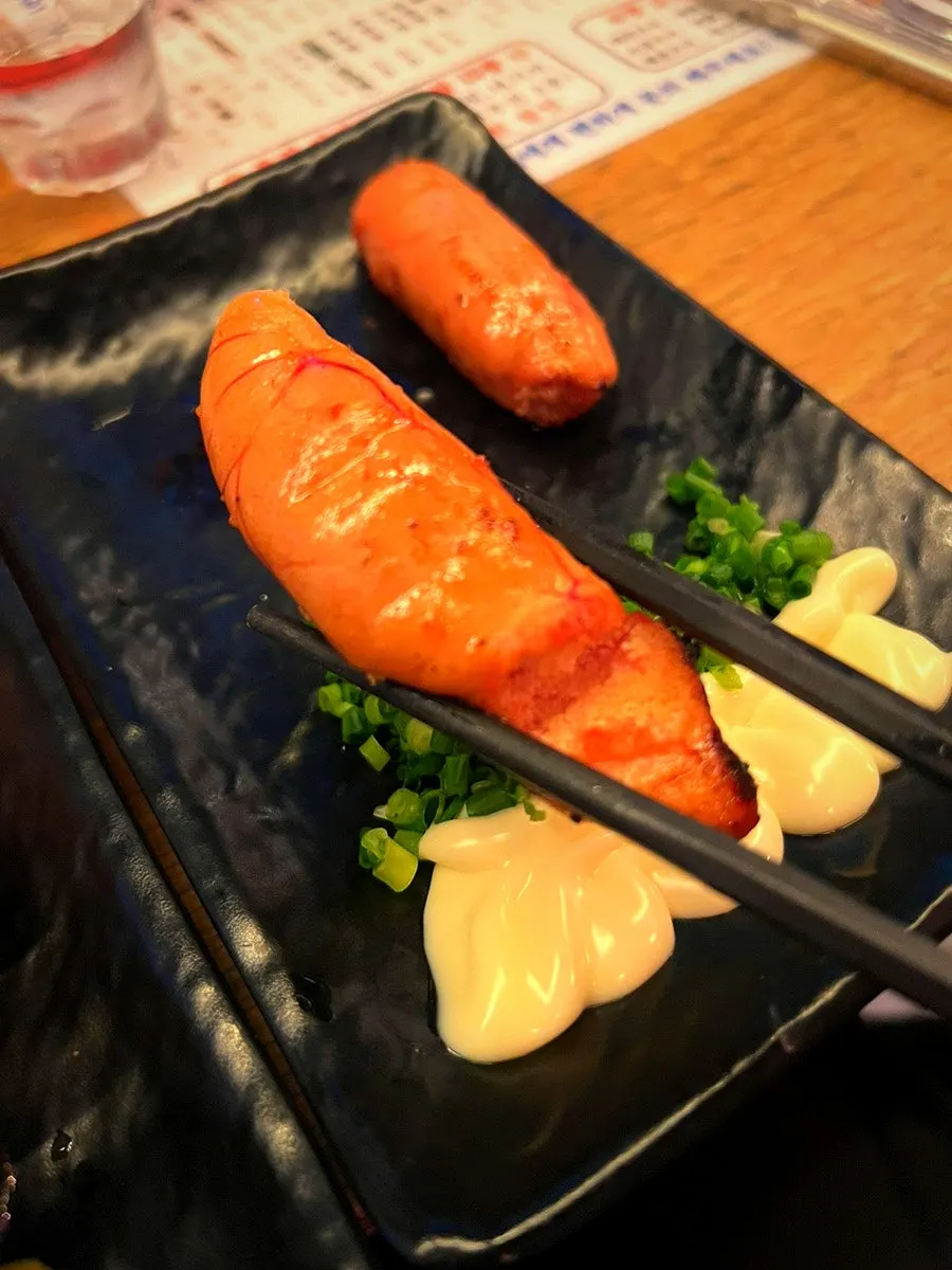 A plate of charcoal-grilled yakitori skewers