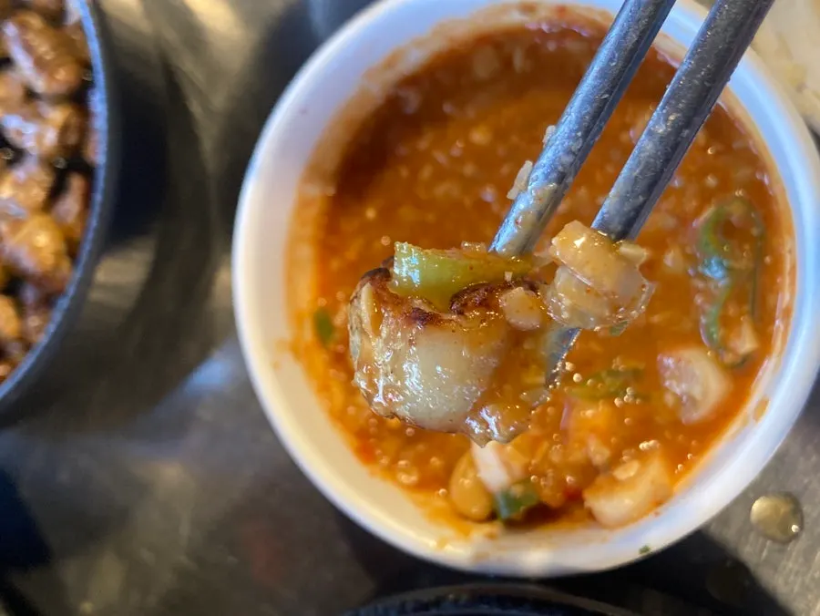 Table with makjang dipping sauce and salt