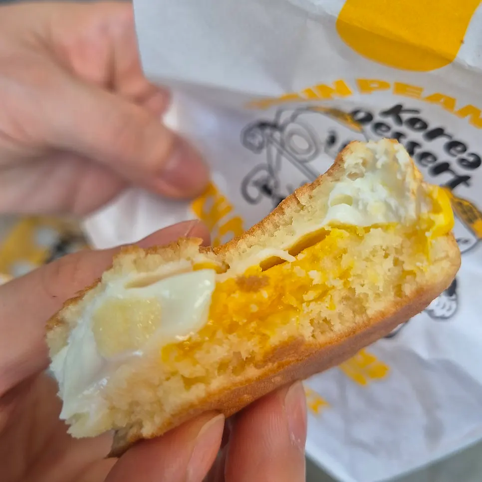 Cross-section of a soft, fluffy egg bread split in half
