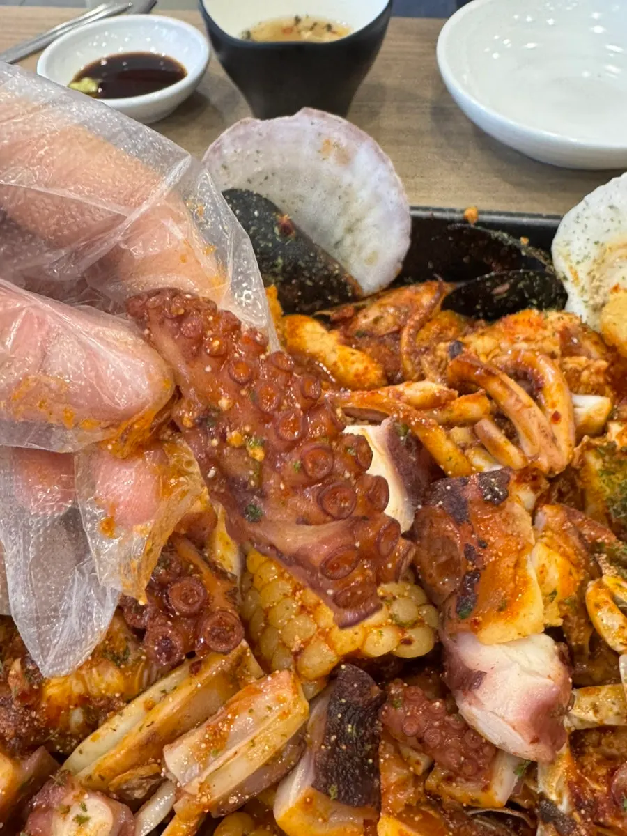 Plate with octopus and crab in the boil