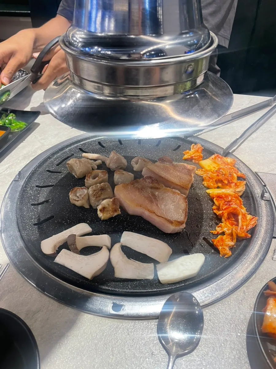 Kimchi and mushrooms grilled on the barbecue