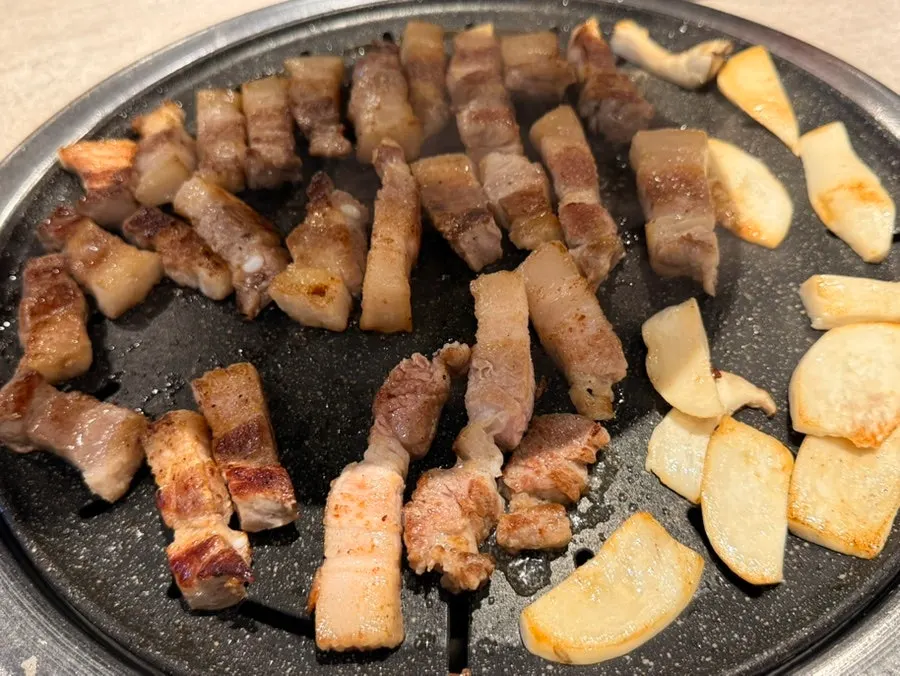 Thick pork belly on the grill