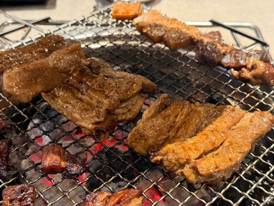 Pork belly grilling on the grill plate