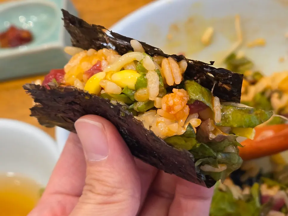Yukhoe bibimbap wrapped in roasted seaweed