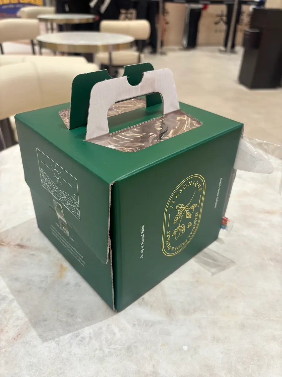 Siznique cake packaging held upright