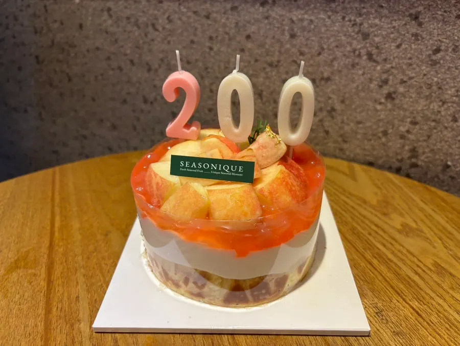 Top of the cake topped with peaches