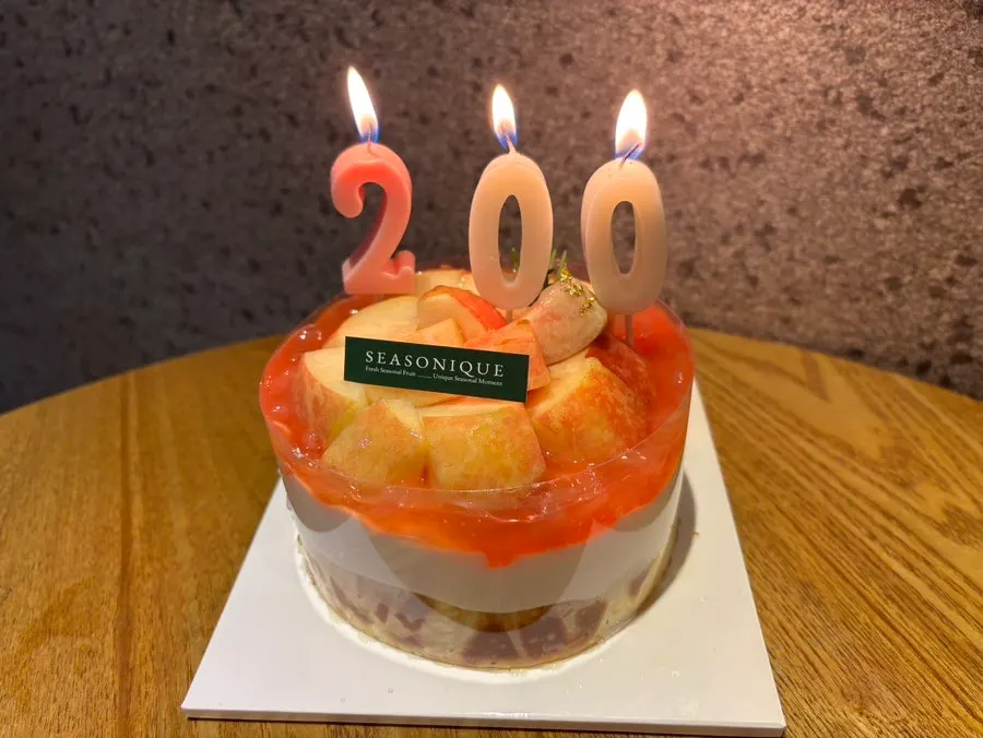 Sliced peach cake plated