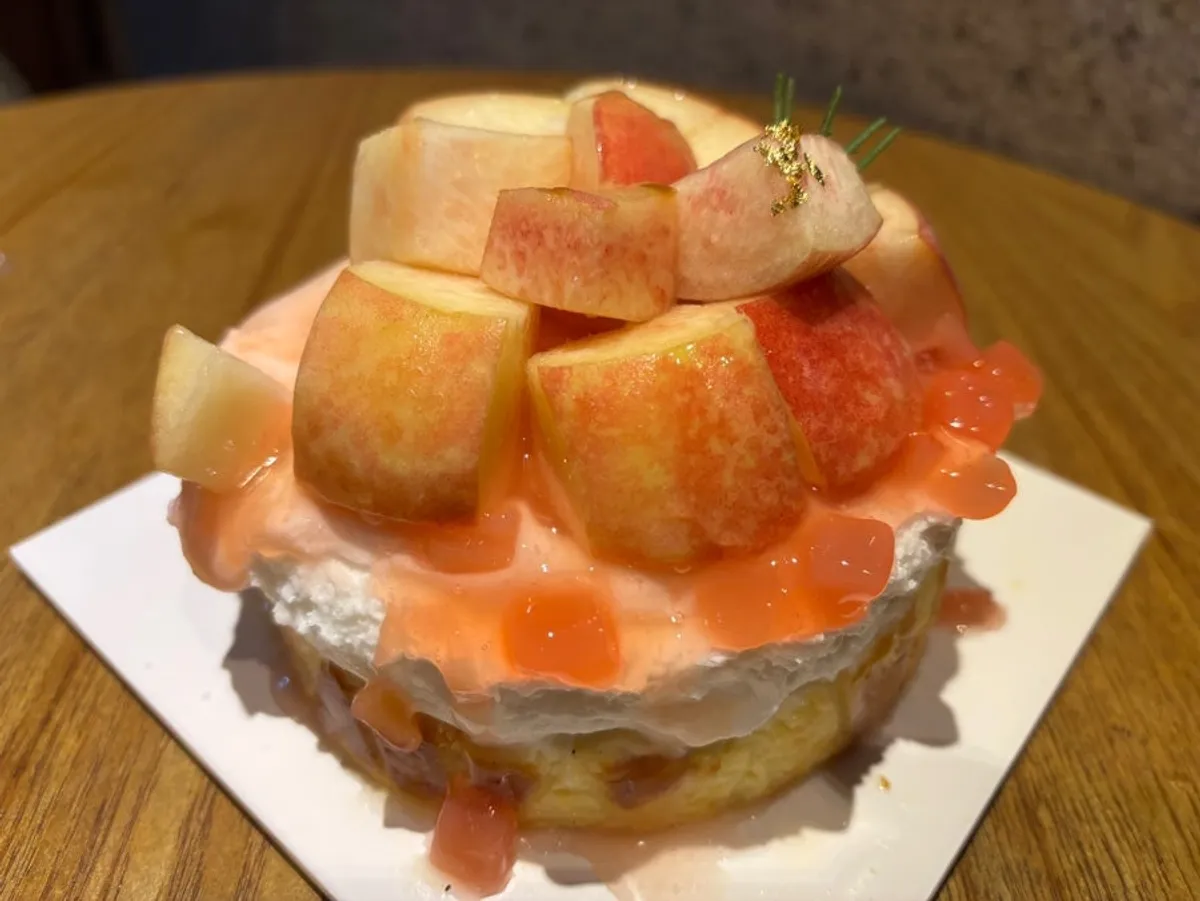 Close-up of Siznique's peach cake