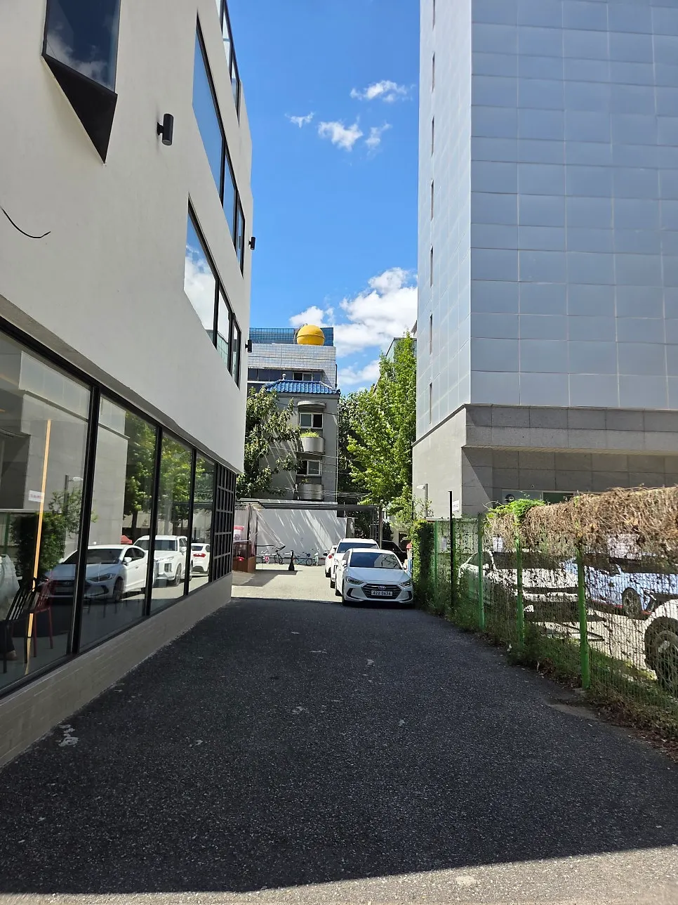 Exterior of Baut occupying the entire three-story building