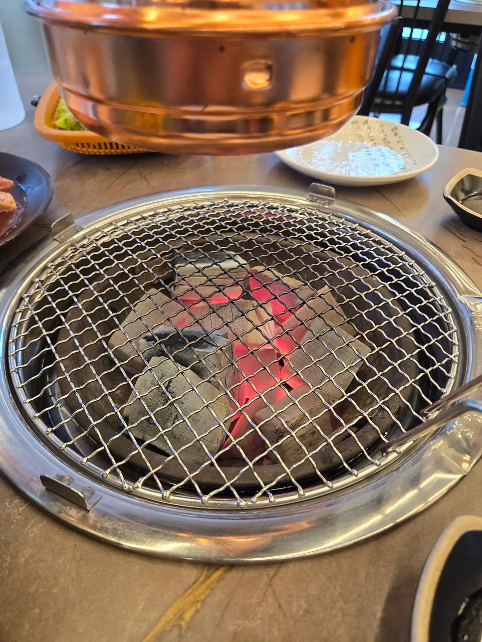 Plate of marinated pork galbi served with king oyster mushrooms