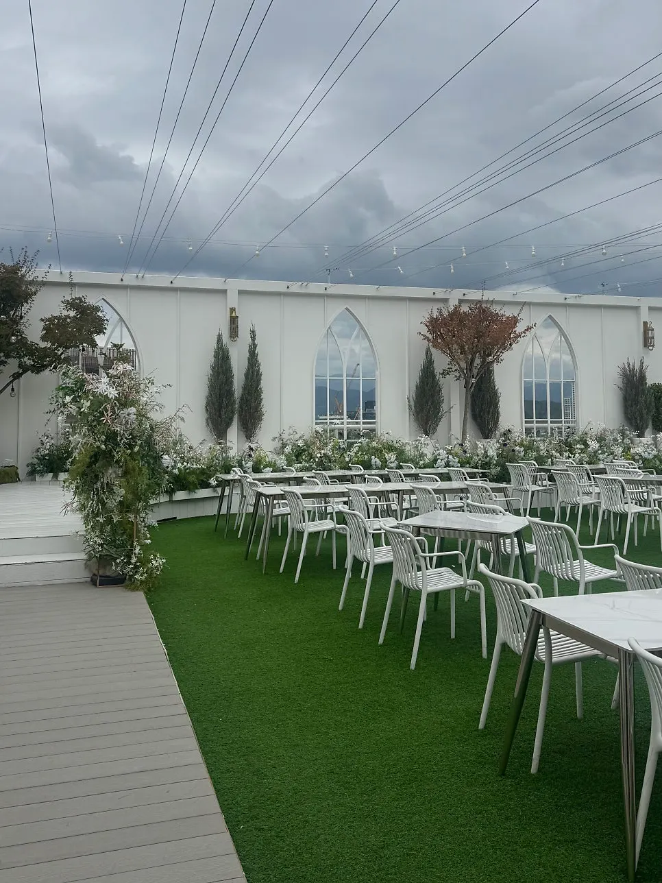 3rd-floor outdoor wedding hall on a cloudy day