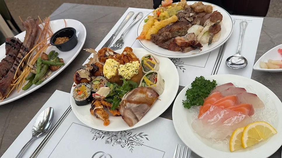 Assorted sashimi and premium beef ribs set on the table