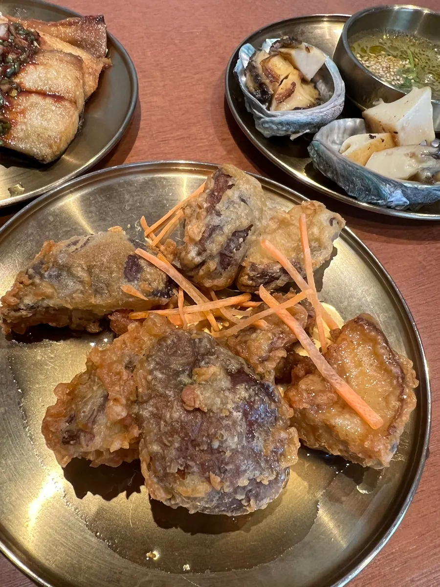 Plump grilled Spanish mackerel served as a basic side dish