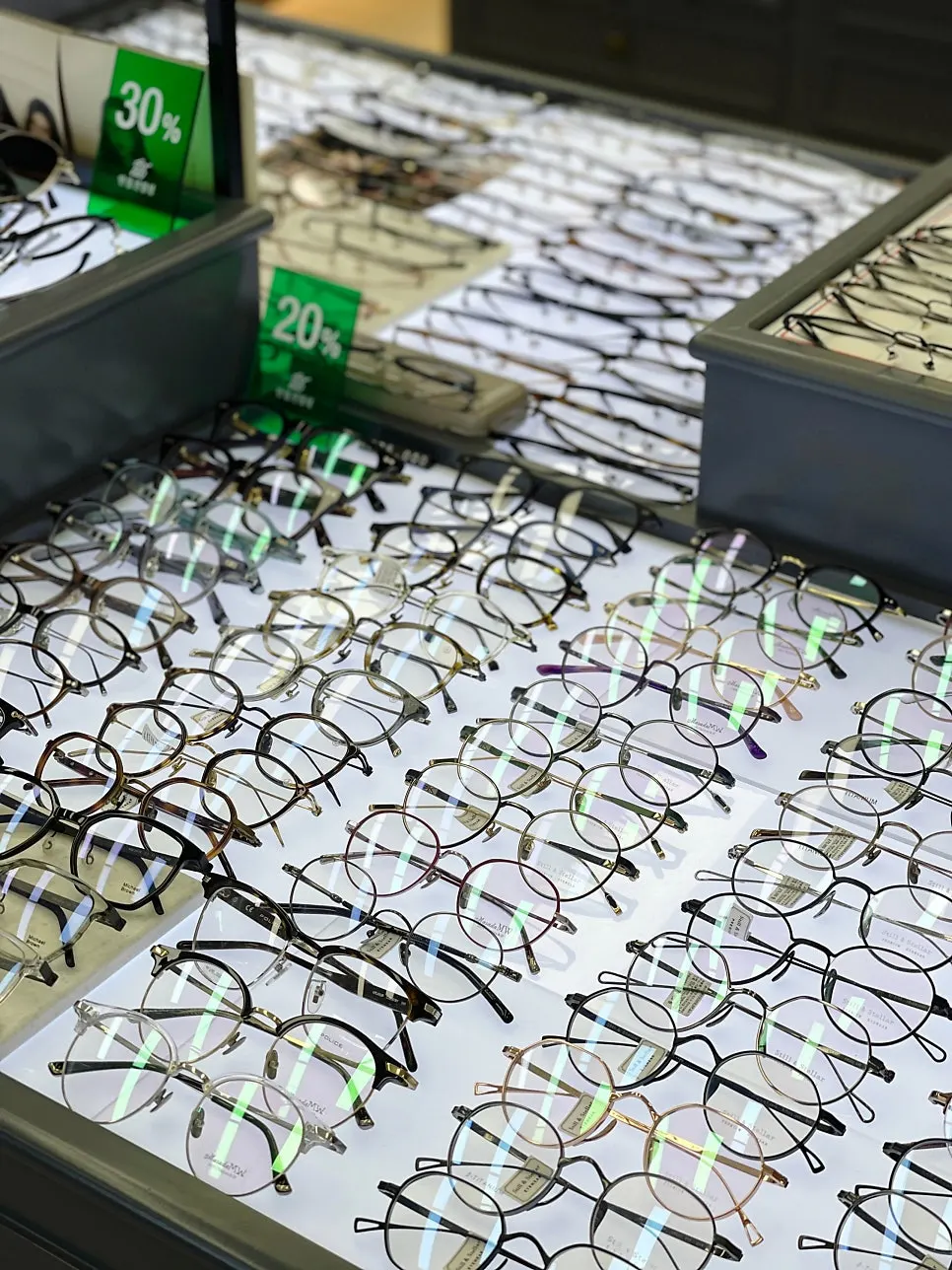 Interior of the shop with glasses frames organized by type