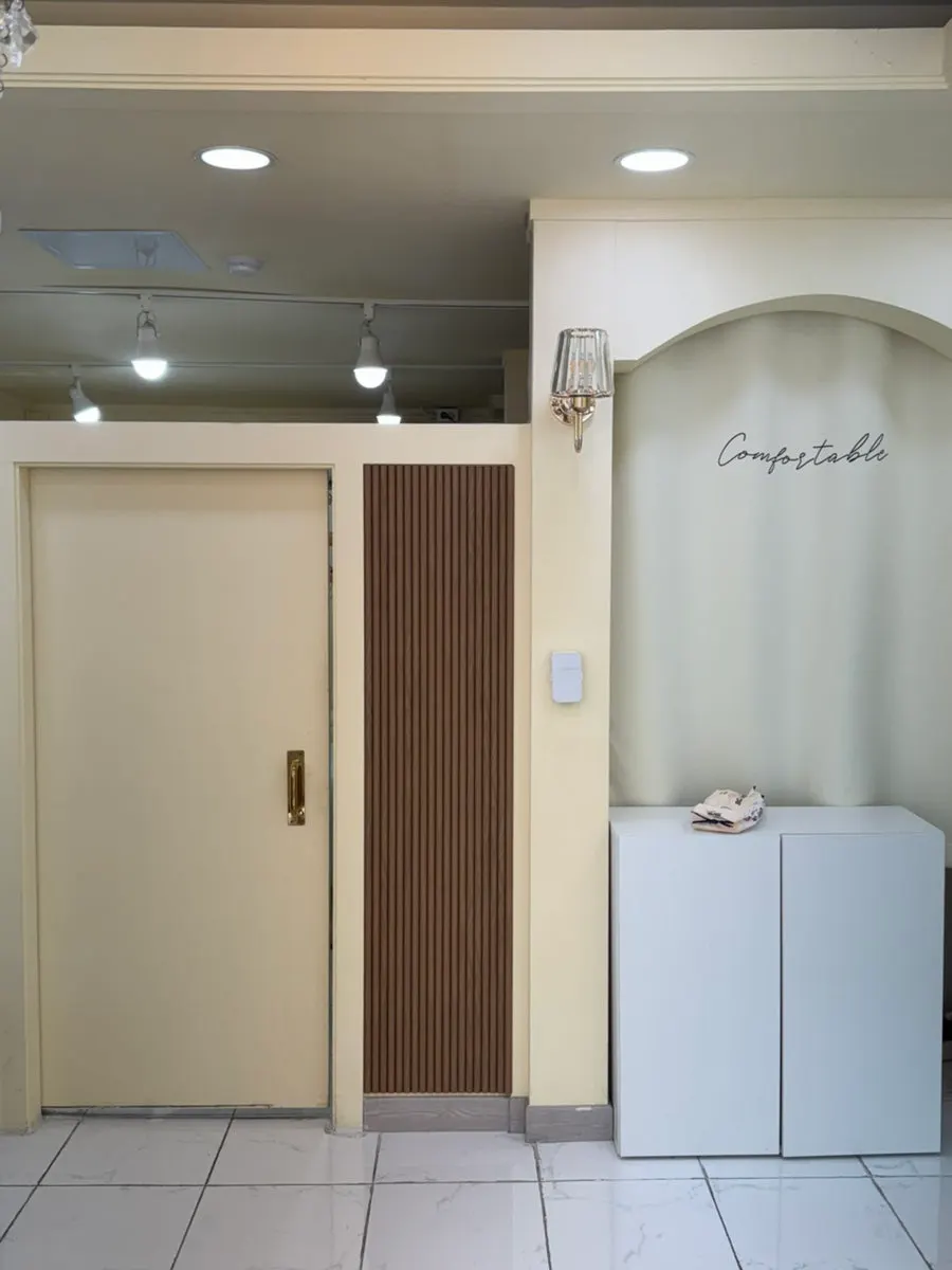 Private treatment space with a chandelier
