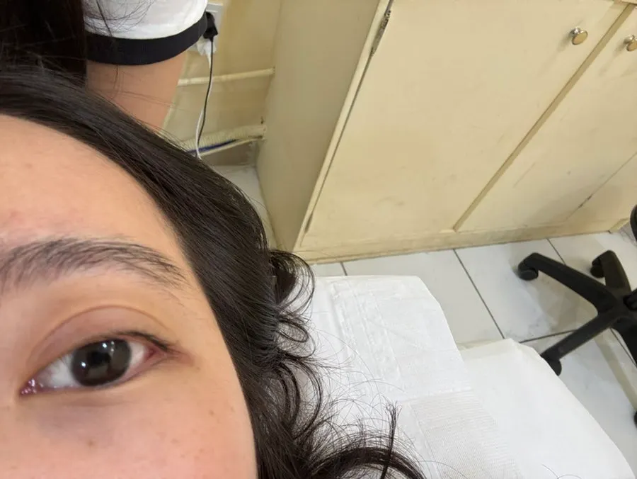 Final check of lashes and brows before treatment