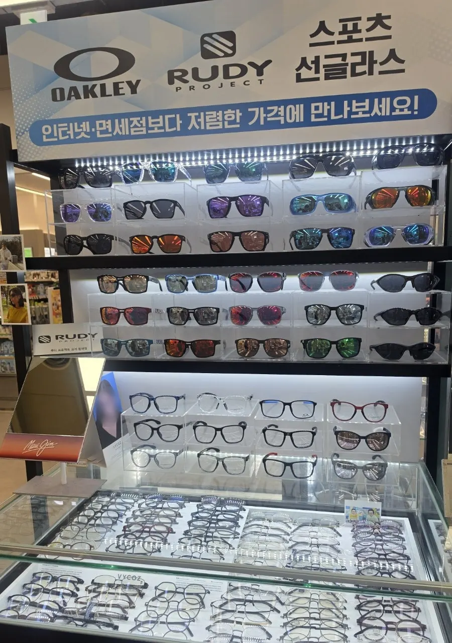 Various Oakley sunglasses models on display