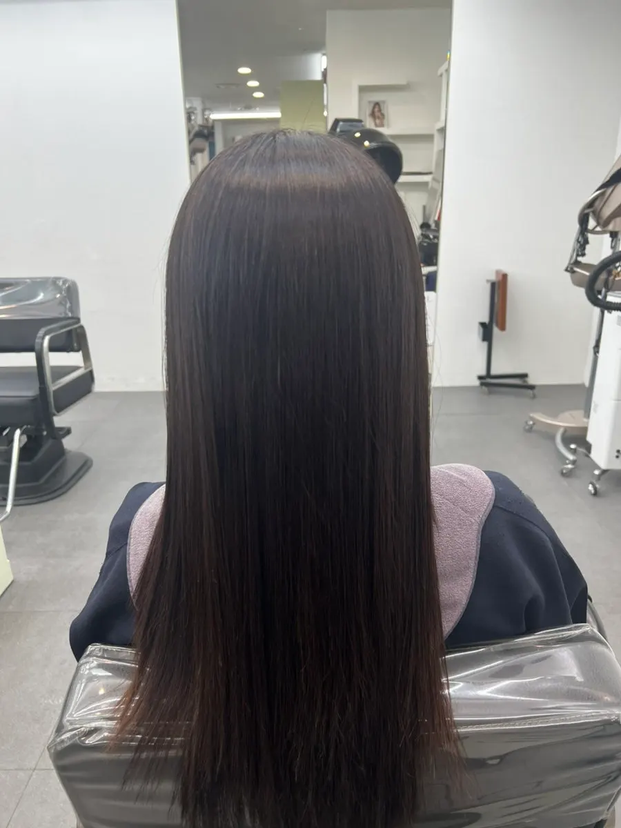 Glossy hair after the repair magic straightening was completed