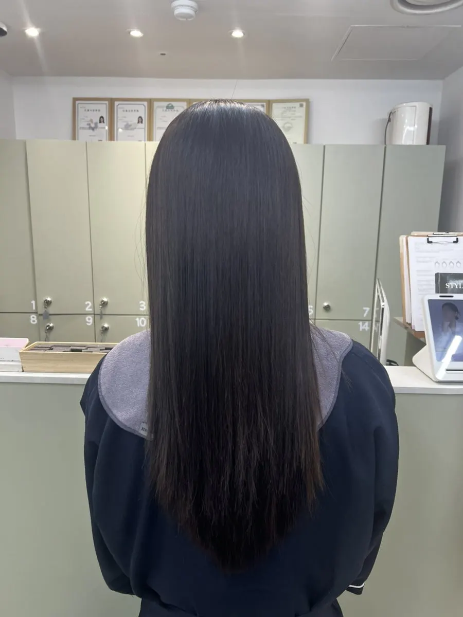 Even the crown flyaways smoothed out in the magic straightening result