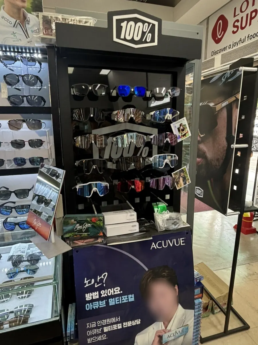 Trying on and comparing several pairs of sunglasses