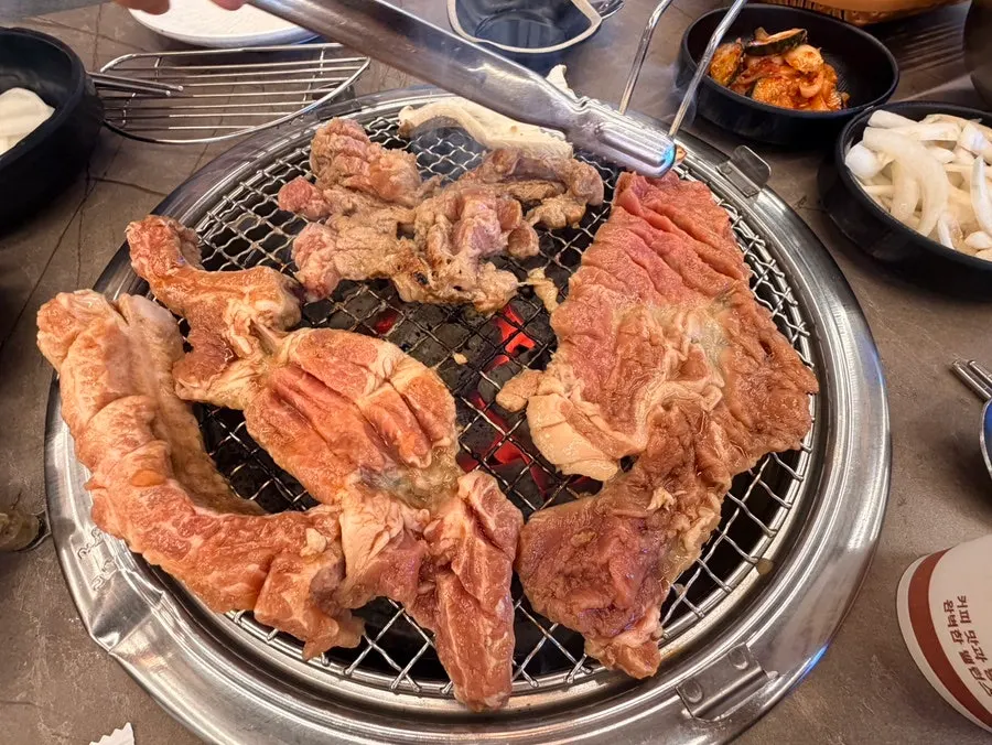 Galbi grilling over charcoal