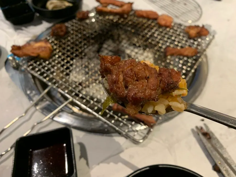 Pre-grilled pork galbi on charcoal