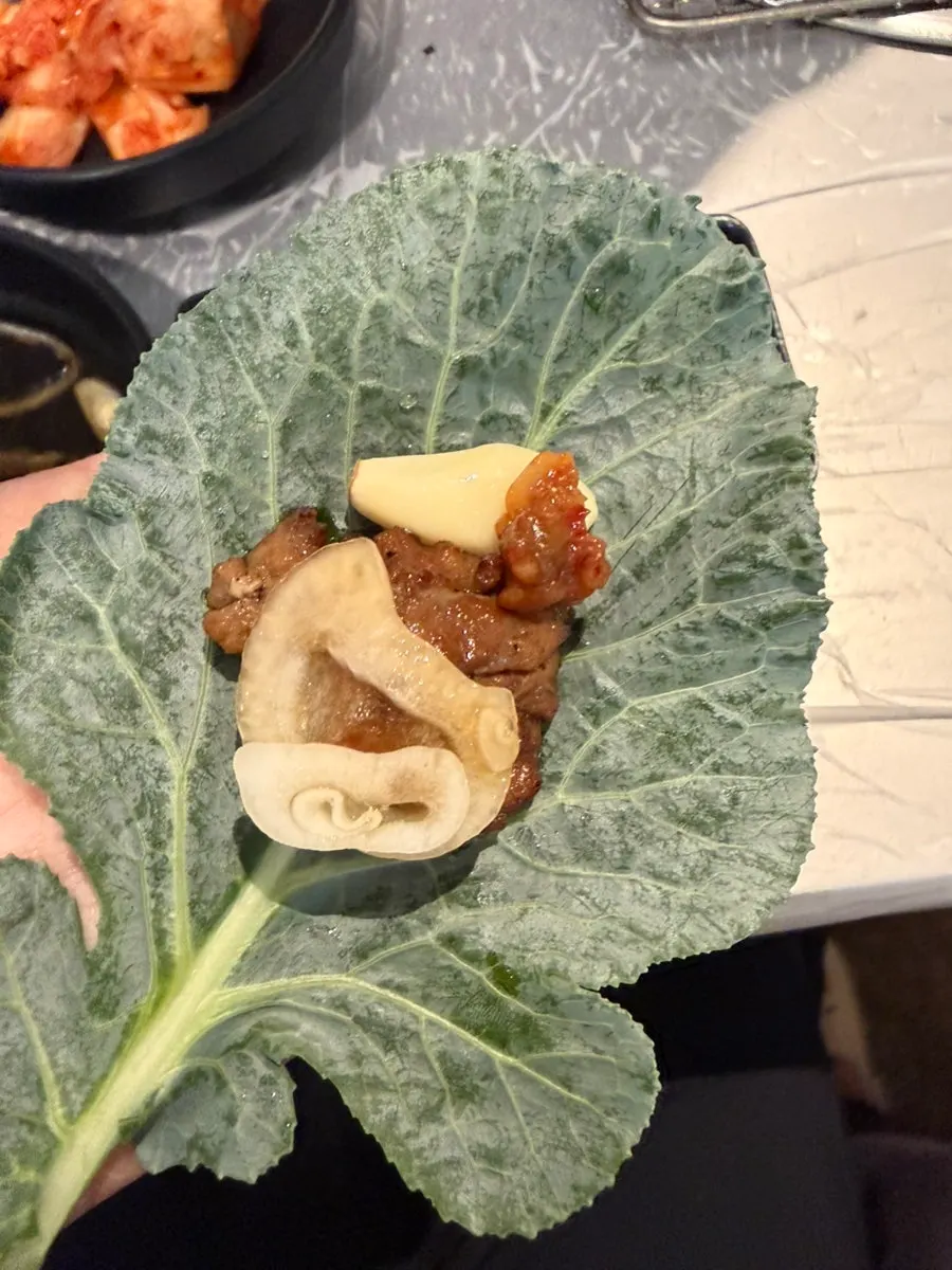 Pork galbi wrapped in kale