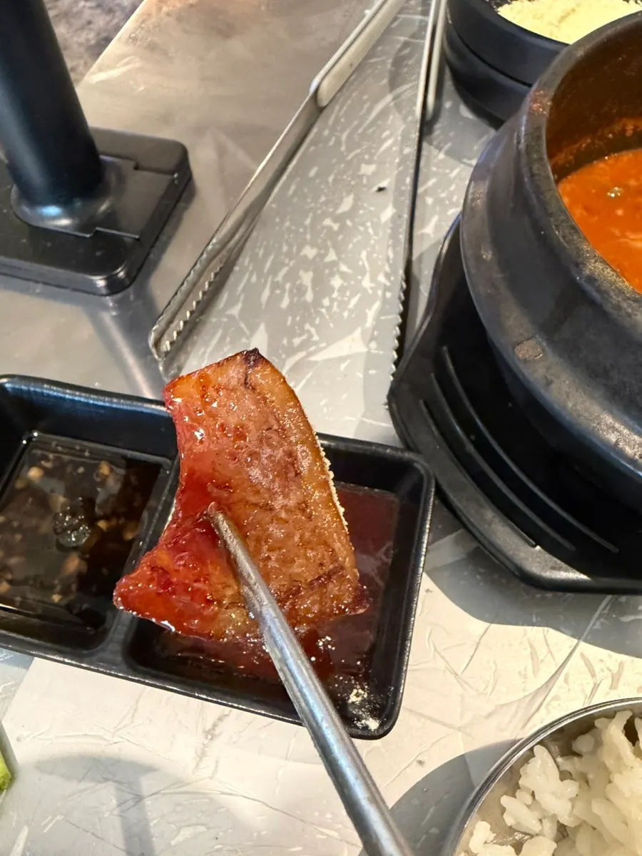Chewy pork skin dipped in sauce