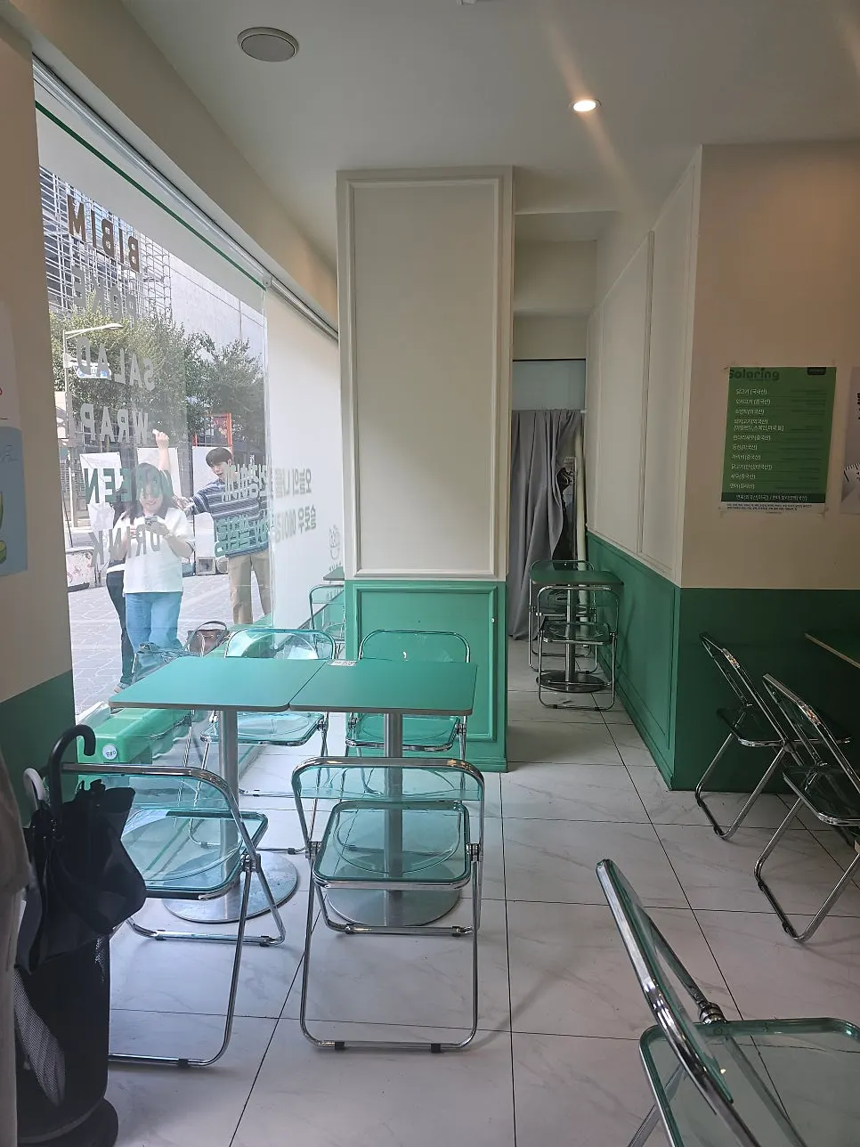 Shop seating with green tables