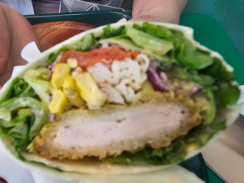 Close-up of shrimp cutlet salad wrap