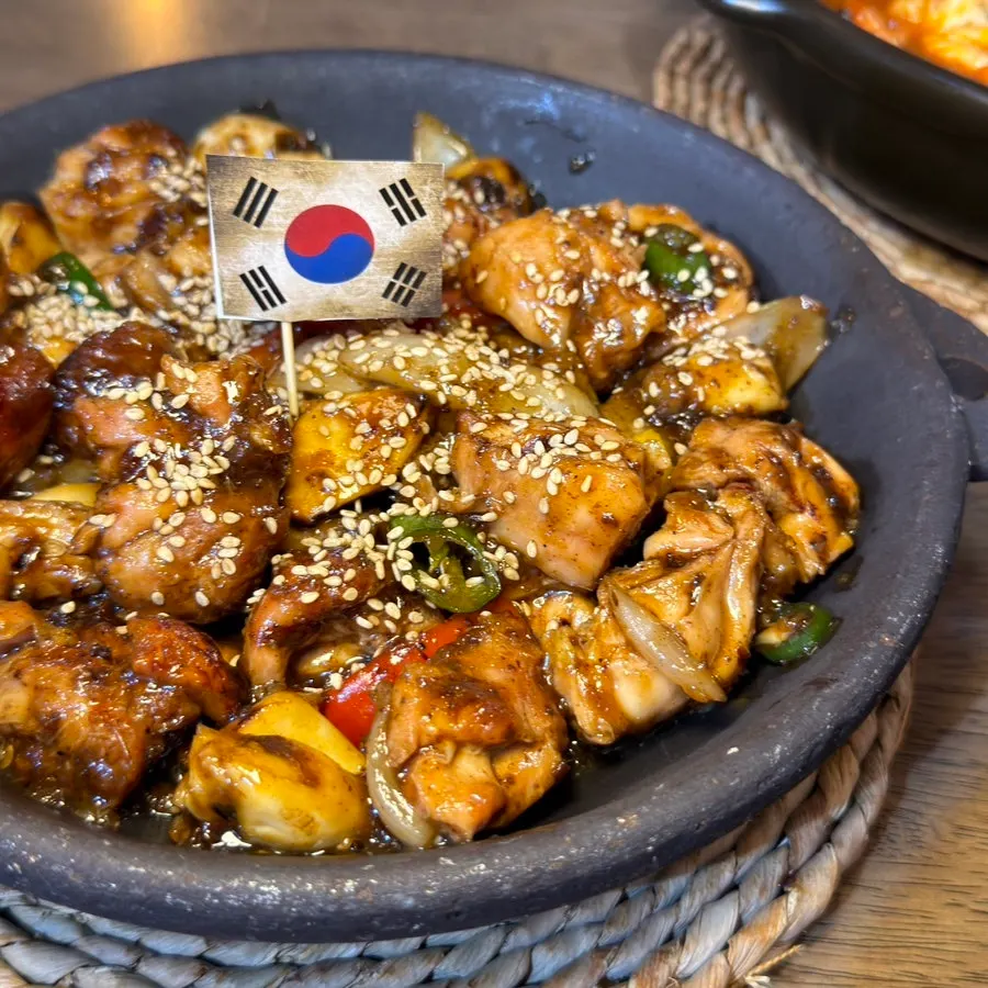Joseon Chicken served with a Korean flag stuck in it