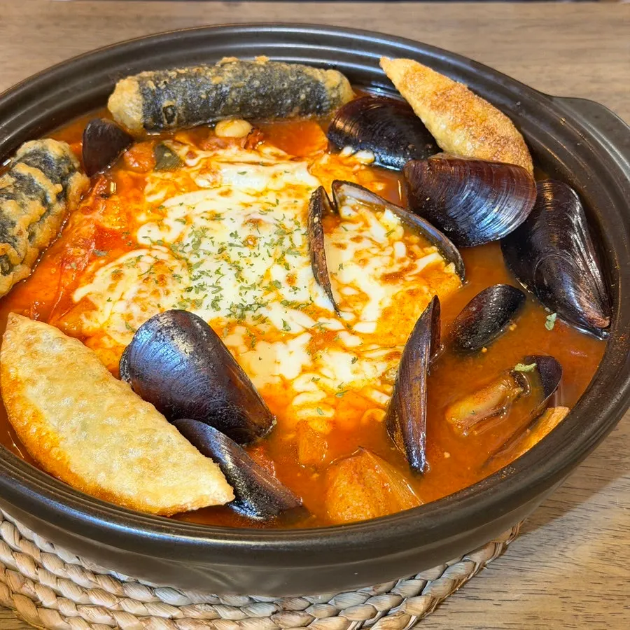 Seafood cheese tteokbokki piled high with cheese