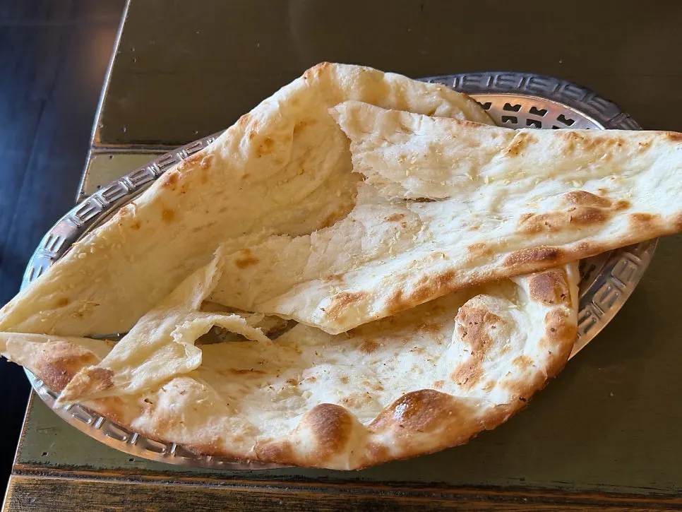 Three kinds of naan ordered with curry