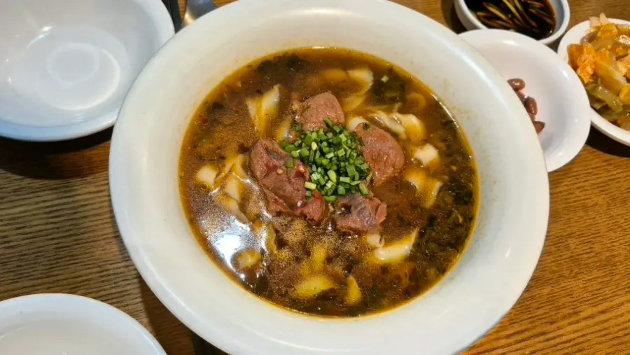A bowl of Cheonghwawon's Taiwanese-style beef knife-cut noodles