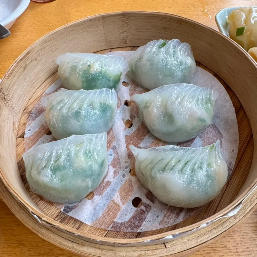 Cheonghwawon's crystal moon dumplings in a bamboo steamer
