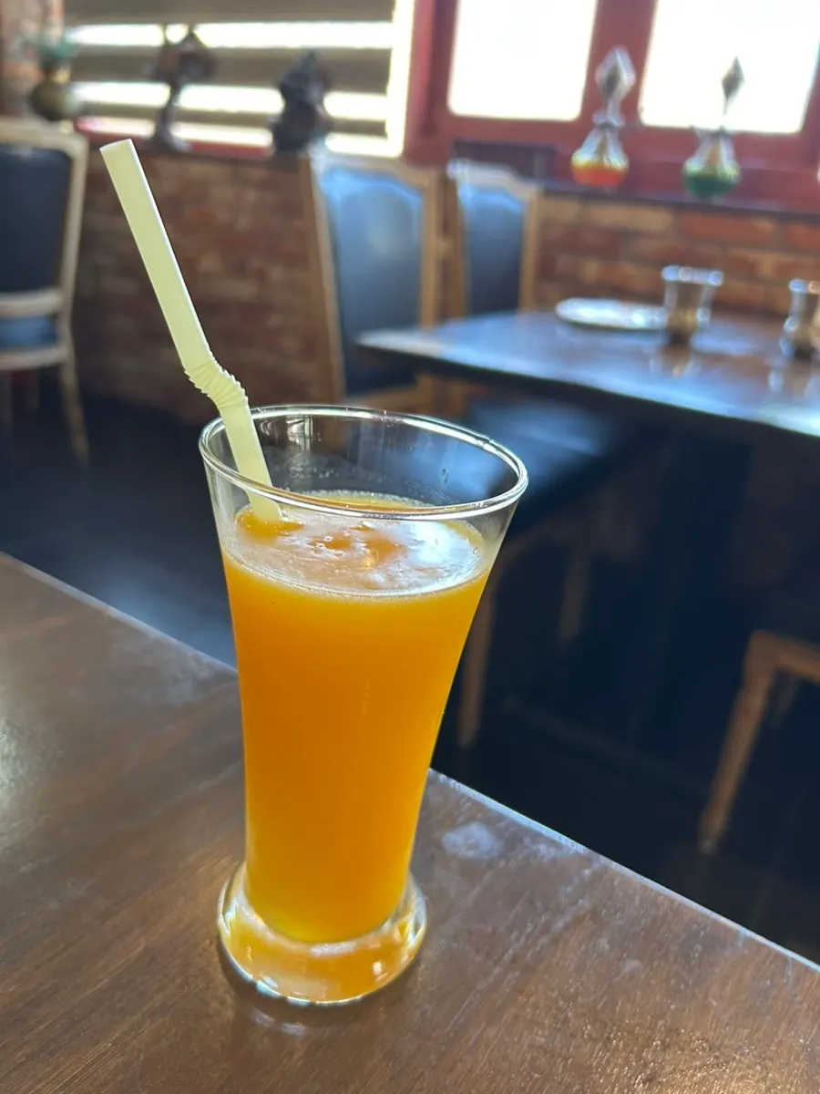 Mangoo Assi and mango juice