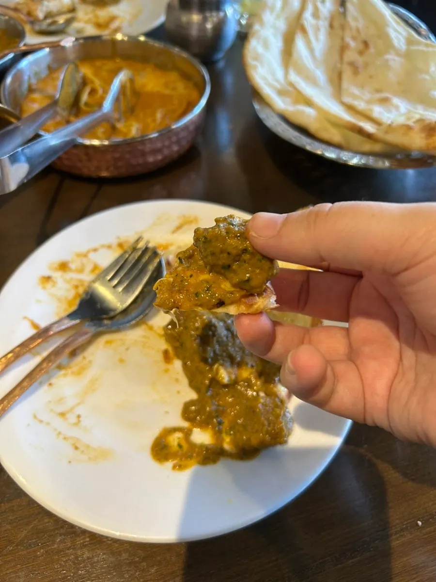 Indian food paired with mango drinks