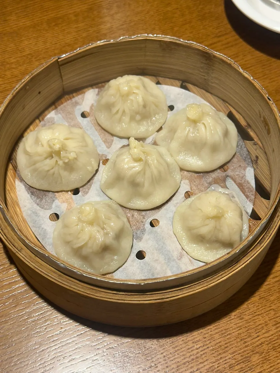 Xiaolongbao served in a steamer basket