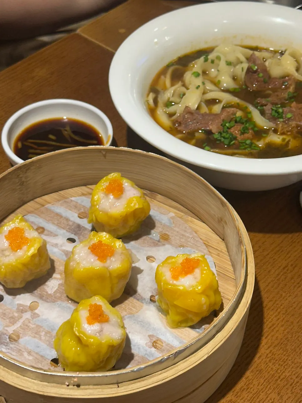 Shumai topped with flying fish roe