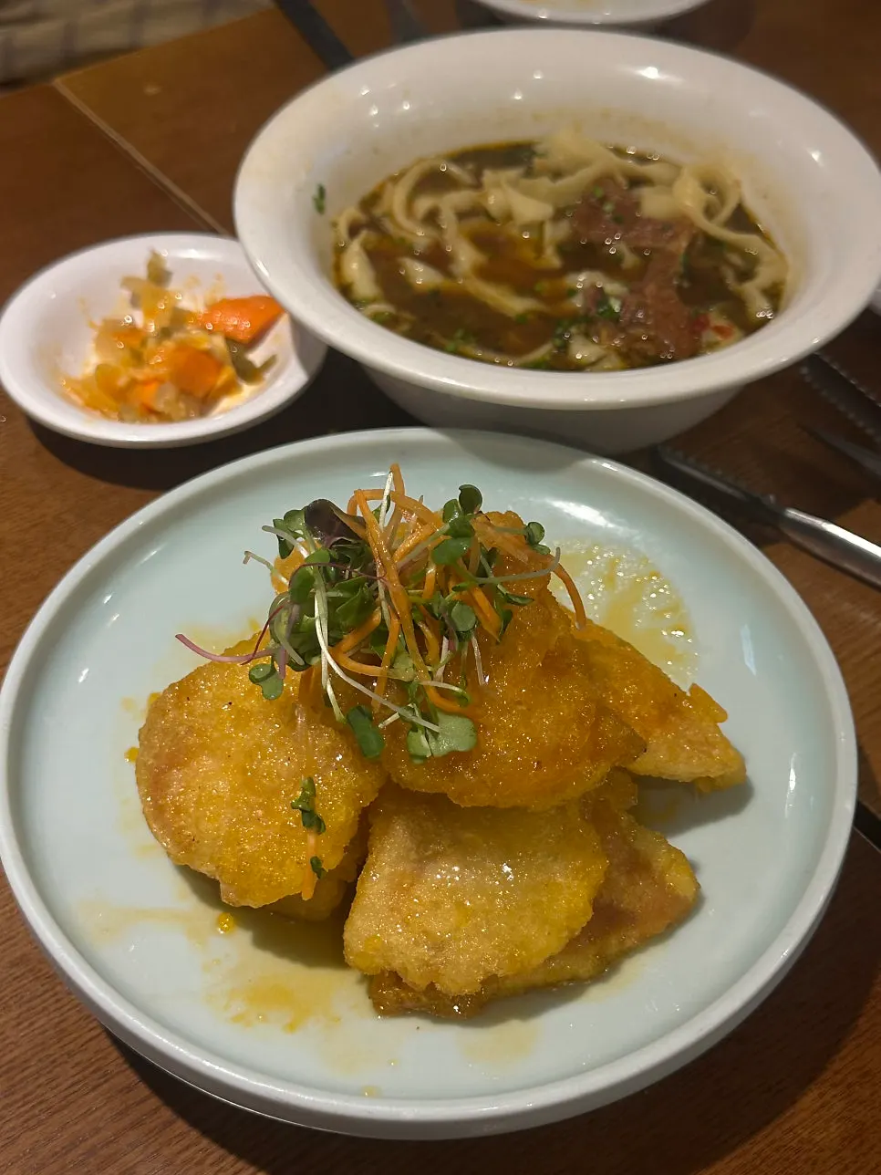 Broth and noodle strands of beef knife-cut noodles