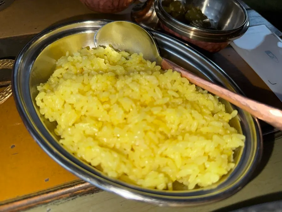 Plate with curry and saffron rice together