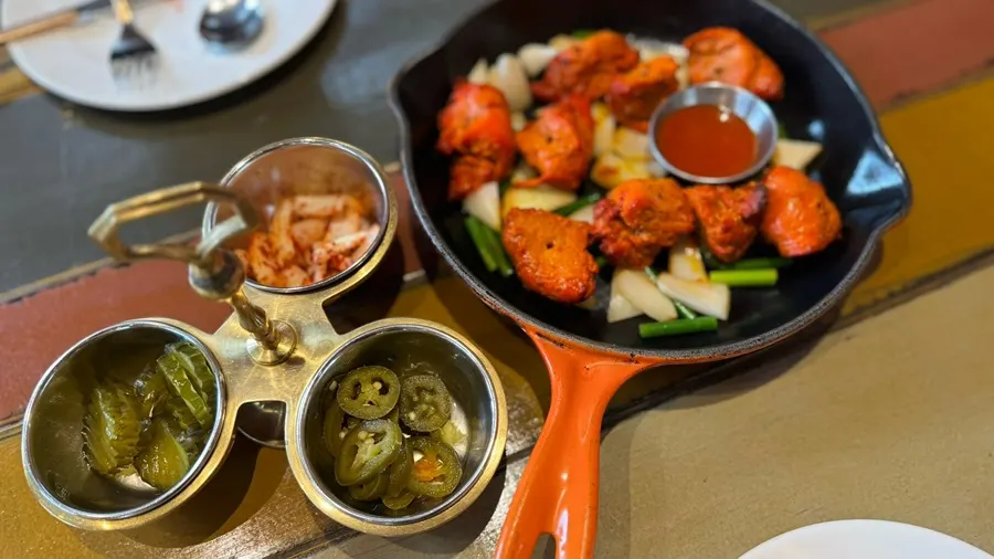 Chicken Tikka HALF served on a hot pan